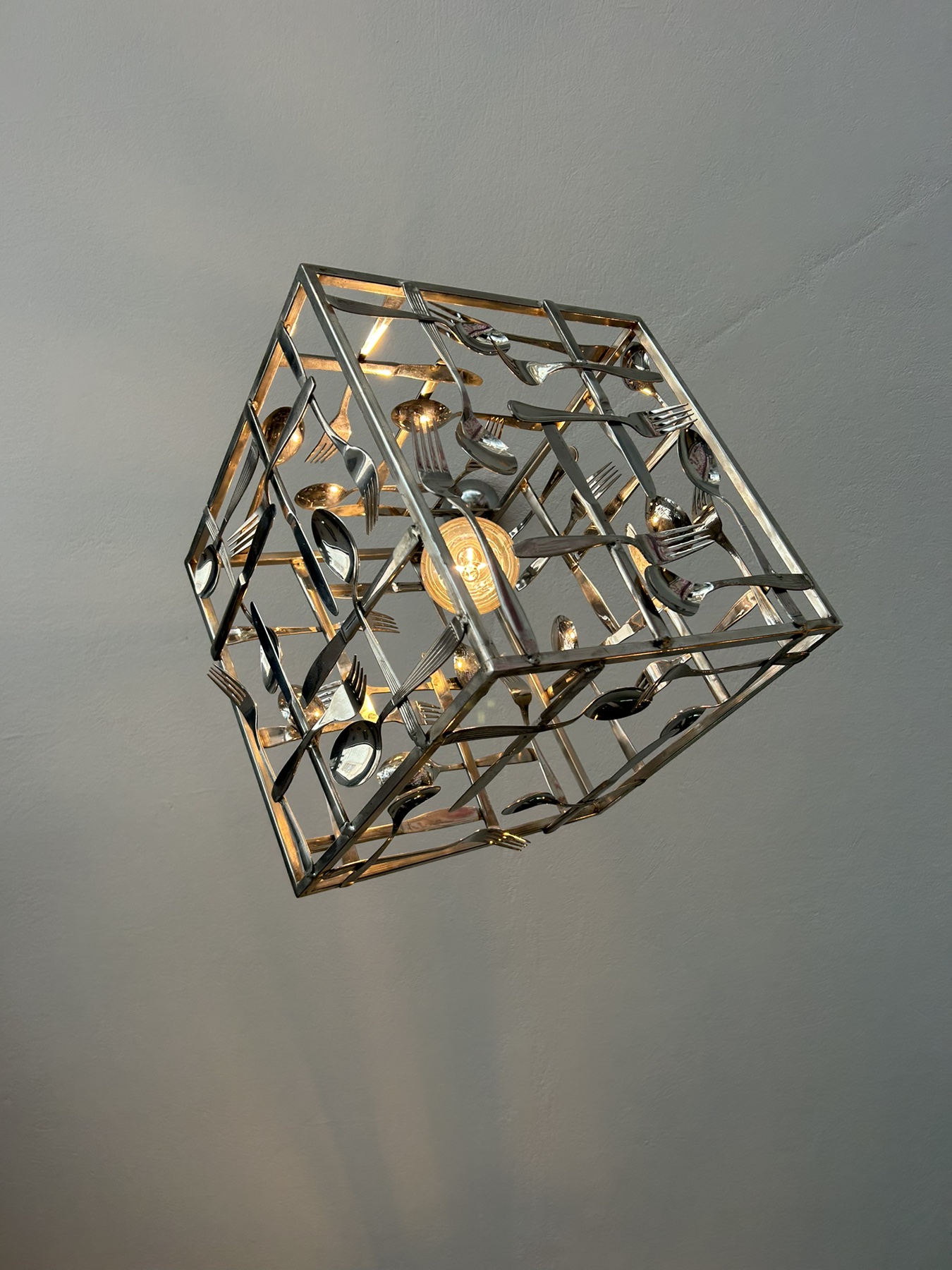 Ceiling light fixture made from cutlery
